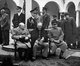 The Yalta Conference, sometimes called the Crimea Conference and codenamed the Argonaut Conference, held February 4–11, 1945, was the World War II meeting of the heads of government of the United States, the United Kingdom and the Soviet Union, represented by President Franklin D. Roosevelt, Prime Minister Winston Churchill and Premier Joseph Stalin, respectively, for the purpose of discussing Europe's post-war reorganization. The conference convened in the Livadia Palace near Yalta in Crimea.<br/><br/>

The meeting was intended mainly to discuss the re-establishment of the nations of war-torn Europe. Within a few years, with the Cold War dividing the continent, Yalta became a subject of intense controversy. To some extent, it has remained controversial.<br/><br/>

Also present are Soviet Foreign Minister Vyacheslav Molotov (far left); Field Marshal Sir Alan Brooke, Admiral of the Fleet Sir Andrew Cunningham, RN, Marshal of the RAF Sir Charles Portal, RAF, (standing behind Churchill); General George C. Marshall, Chief of Staff of the United States Army, and Fleet Admiral William D. Leahy, USN, (standing behind Roosevelt).